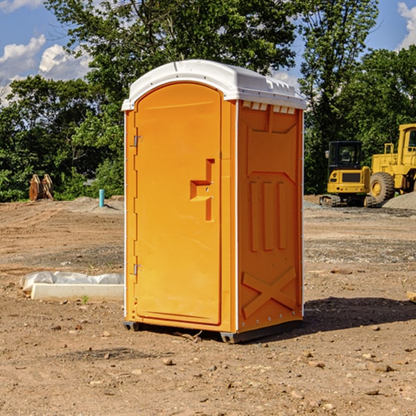 what is the cost difference between standard and deluxe portable restroom rentals in Adamstown